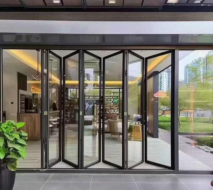 Tukang aluminium finished good pintu lipat bergaransi